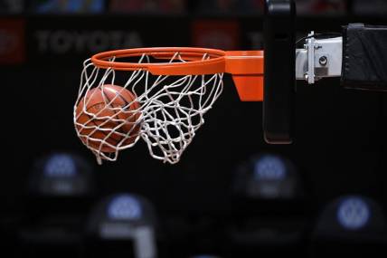 Jan 7, 2021; San Diego, California, USA; A detailed view of a Nike basketball going through a hoop before the game between the San Diego State Aztecs and the Nevada Wolf Pack at Viejas Arena. Mandatory Credit: Orlando Ramirez-USA TODAY Sports