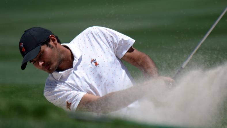 Jun 1, 2021; Scottsdale, Arizona, USA; Oklahoma State University golfer Eugenio Lopez-Chacarra hits out of the  first bunker during the NCAA Men's Golf Championship Semifinal at Grayhawk Golf Course. Mandatory Credit: Joe Camporeale-USA TODAY Sports