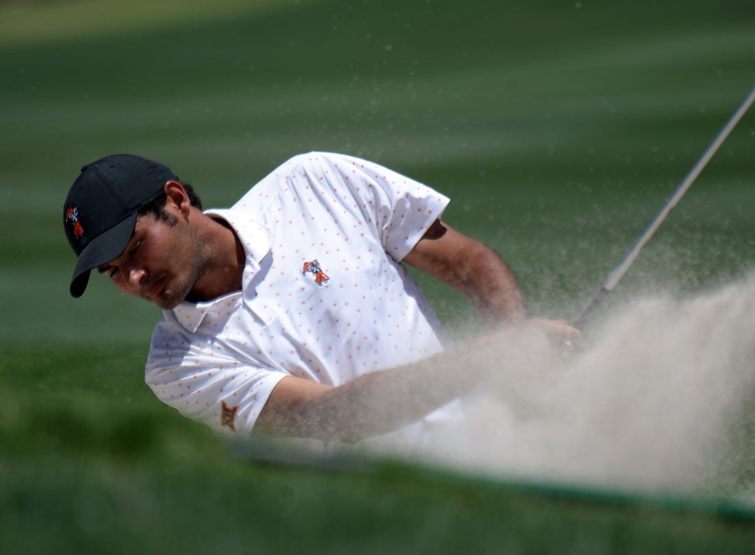 Jun 1, 2021; Scottsdale, Arizona, USA; Oklahoma State University golfer Eugenio Lopez-Chacarra hits out of the  first bunker during the NCAA Men's Golf Championship Semifinal at Grayhawk Golf Course. Mandatory Credit: Joe Camporeale-USA TODAY Sports