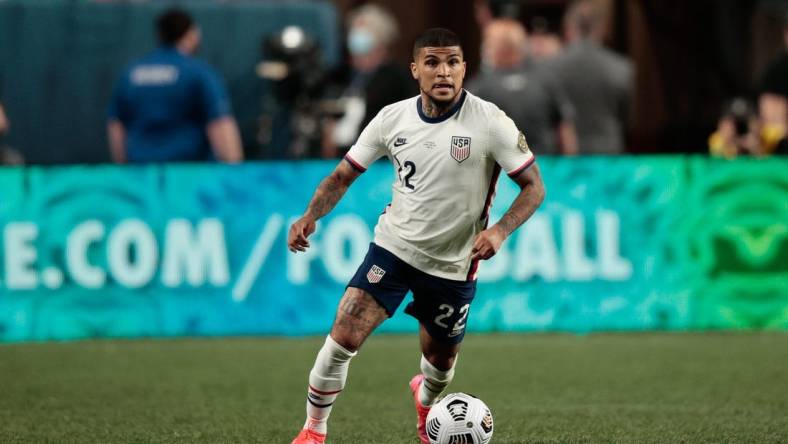 Jun 6, 2021; Denver, Colorado, USA; United States defender Deandre Yedlin (22) controls the ball in the second half against Mexico during the 2021 CONCACAF Nations League Finals soccer series final match at Empower Field at Mile High. Mandatory Credit: Isaiah J. Downing-USA TODAY Sports