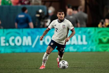 Jun 6, 2021; Denver, Colorado, USA; United States defender Deandre Yedlin (22) controls the ball in the second half against Mexico during the 2021 CONCACAF Nations League Finals soccer series final match at Empower Field at Mile High. Mandatory Credit: Isaiah J. Downing-USA TODAY Sports
