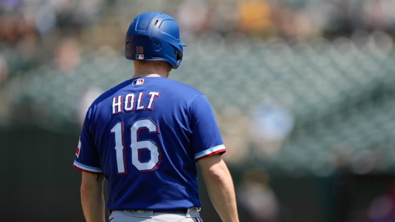 Aug 8, 2021; Oakland, California, USA;  Texas Rangers second baseman Brock Holt (16) during the fifth inning against the Oakland Athletics at RingCentral Coliseum. Mandatory Credit: Stan Szeto-USA TODAY Sports