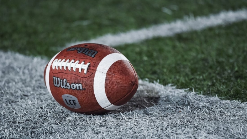 Oct 22, 2021; Montreal, Quebec, CAN; view of a CFL game ball with a french logo on the field before the first quarter during a Canadian Football League game at Molson Stadium. Mandatory Credit: David Kirouac-USA TODAY Sports