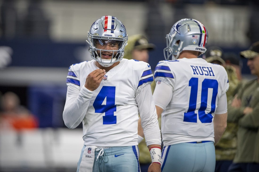 Nov 7, 2021; Arlington, Texas, USA; Dallas Cowboys quarterback Cooper Rush (10) and quarterback Dak Prescott (4) before the game between the Dallas Cowboys and the Denver Broncos at AT&T Stadium. Mandatory Credit: Jerome Miron-USA TODAY Sports