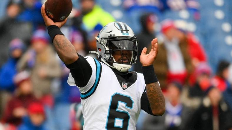 Dec 19, 2021; Orchard Park, New York, USA; Carolina Panthers quarterback P.J. Walker (6) warms up prior to the game against the Buffalo Bills at Highmark Stadium. Mandatory Credit: Rich Barnes-USA TODAY Sports