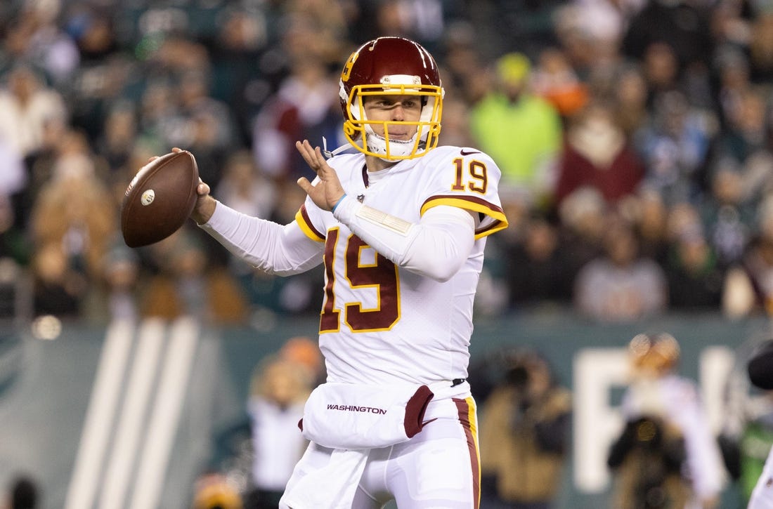 Dec 21, 2021; Philadelphia, Pennsylvania, USA; Washington Football Team quarterback Garrett Gilbert (19) in action against the Philadelphia Eagles at Lincoln Financial Field. Mandatory Credit: Bill Streicher-USA TODAY Sports