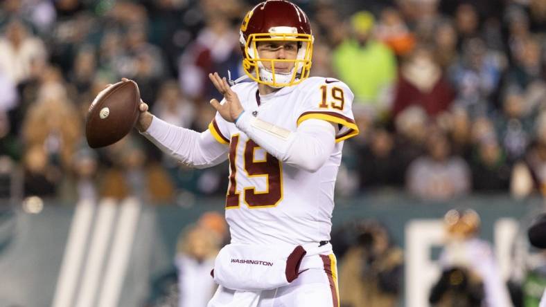 Dec 21, 2021; Philadelphia, Pennsylvania, USA; Washington Football Team quarterback Garrett Gilbert (19) in action against the Philadelphia Eagles at Lincoln Financial Field. Mandatory Credit: Bill Streicher-USA TODAY Sports