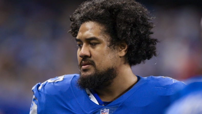 Dec 19, 2021; Detroit, Michigan, USA; Detroit Lions guard Halapoulivaati Vaitai (72) walks on the sidelines during the fourth quarter against the Arizona Cardinals at Ford Field. Mandatory Credit: Raj Mehta-USA TODAY Sports