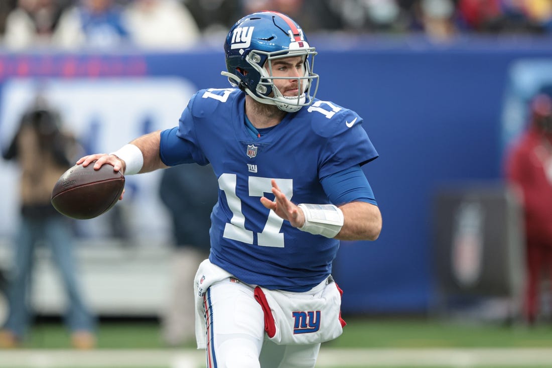 Jan 9, 2022; East Rutherford, New Jersey, USA; New York Giants quarterback Jake Fromm (17) throws the ball against the Washington Football Team during the first half at MetLife Stadium. Mandatory Credit: Vincent Carchietta-USA TODAY Sports