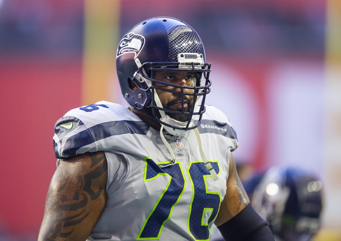 Jan 9, 2022; Glendale, Arizona, USA; Seattle Seahawks offensive tackle Duane Brown (76) against the Arizona Cardinals at State Farm Stadium. Mandatory Credit: Mark J. Rebilas-USA TODAY Sports