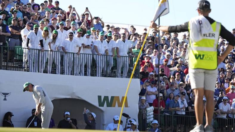 Feb 11, 2022; Scottsdale, Arizona, USA;  Rickie Fowler putts on the 16th green during Round 2 of the WM Phoenix Open at TPC Scottsdale.

Pga Phoenix Open