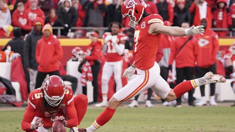 Jan 30, 2022; Kansas City, Missouri, USA; Kansas City Chiefs kicker Harrison Butker (7) kicks a field goal against the Cincinnati Bengals during the AFC Championship game at GEHA Field at Arrowhead Stadium. Mandatory Credit: Denny Medley-USA TODAY Sports