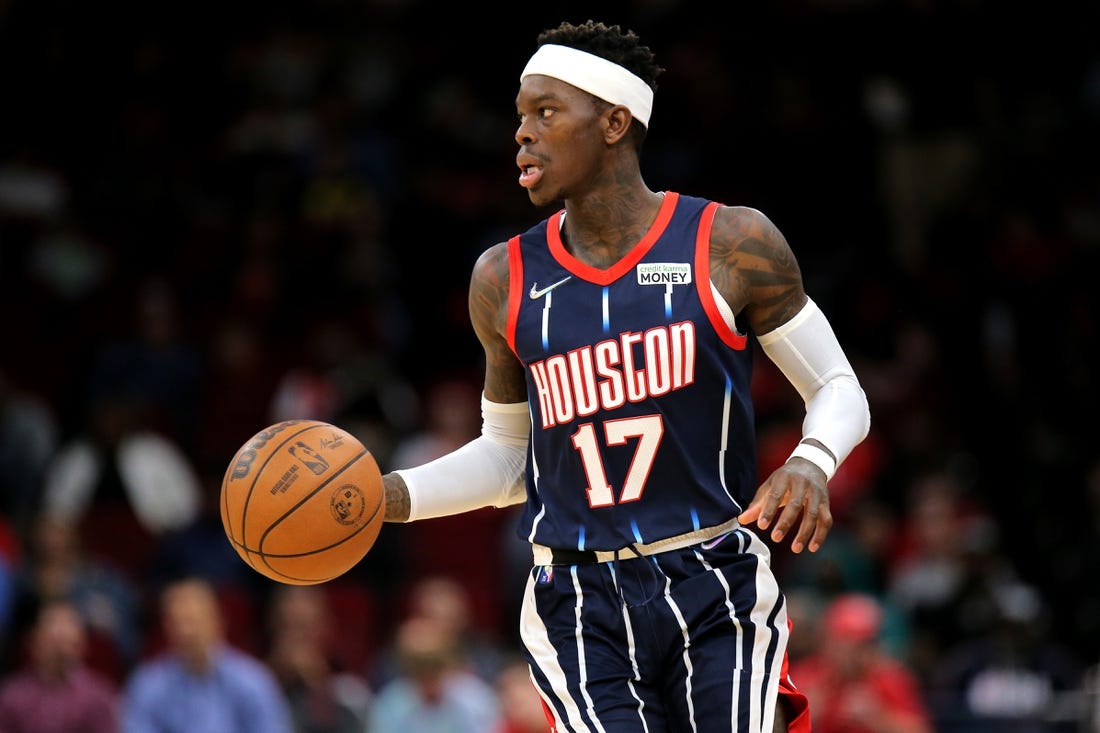 Mar 18, 2022; Houston, Texas, USA; Houston Rockets guard Dennis Schroder (17) handles the ball against the Indiana Pacers during the second quarter at Toyota Center. Mandatory Credit: Erik Williams-USA TODAY Sports