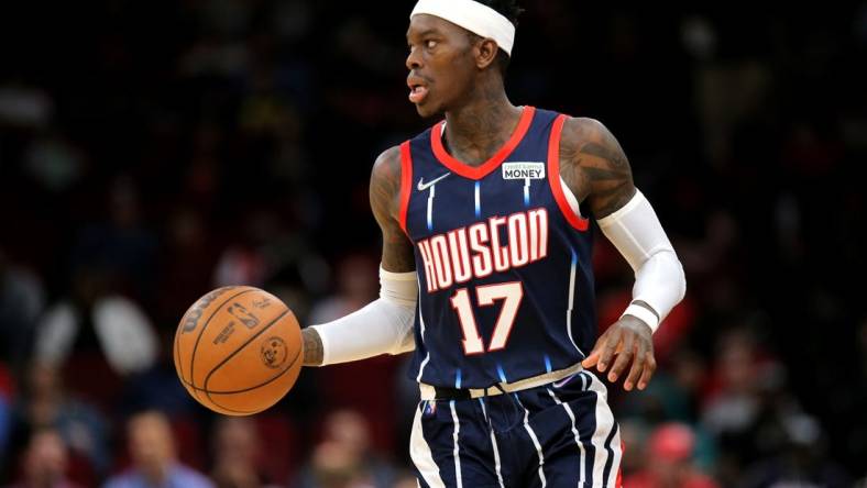 Mar 18, 2022; Houston, Texas, USA; Houston Rockets guard Dennis Schroder (17) handles the ball against the Indiana Pacers during the second quarter at Toyota Center. Mandatory Credit: Erik Williams-USA TODAY Sports