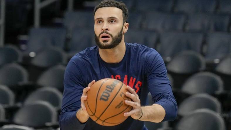 Mar 21, 2022; Charlotte, North Carolina, USA; New Orleans Pelicans forward Larry Nance Jr. (22) during pregame warmups against the Charlotte Hornets at Spectrum Center. Mandatory Credit: Jim Dedmon-USA TODAY Sports