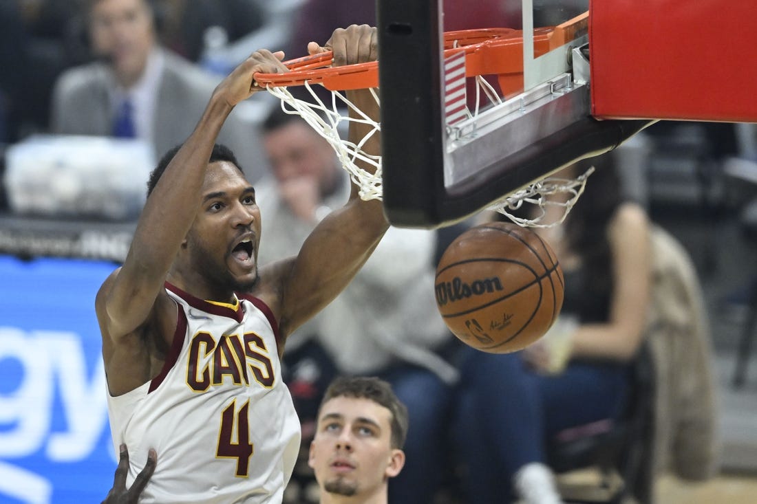 Mar 28, 2022; Cleveland, Ohio, USA; Cleveland Cavaliers center Evan Mobley (4) dunks in the first quarter against the Orlando Magic at Rocket Mortgage FieldHouse. Mandatory Credit: David Richard-USA TODAY Sports