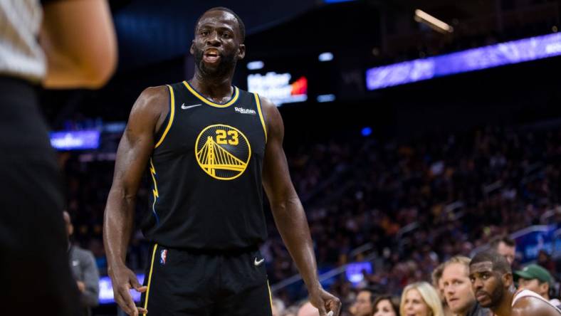 Mar 30, 2022; San Francisco, California, USA; Golden State Warriors forward Draymond Green (23) reacts during the first half against the Phoenix Suns at Chase Center. Mandatory Credit: John Hefti-USA TODAY Sports