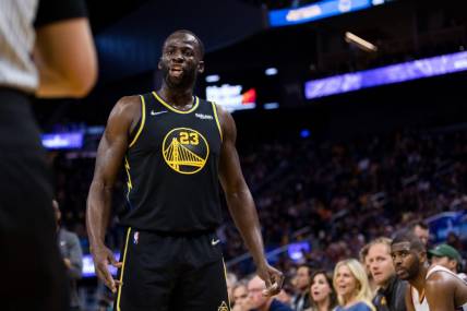 Mar 30, 2022; San Francisco, California, USA; Golden State Warriors forward Draymond Green (23) reacts during the first half against the Phoenix Suns at Chase Center. Mandatory Credit: John Hefti-USA TODAY Sports