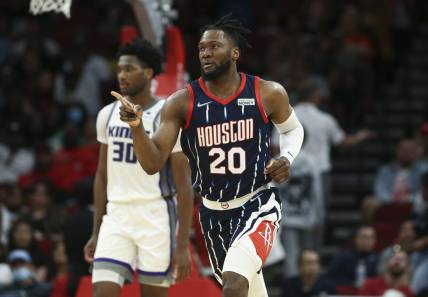 Apr 1, 2022; Houston, Texas, USA; Houston Rockets forward Bruno Fernando (20) reacts after scoring during the third quarter against the Sacramento Kings at Toyota Center. Mandatory Credit: Troy Taormina-USA TODAY Sports