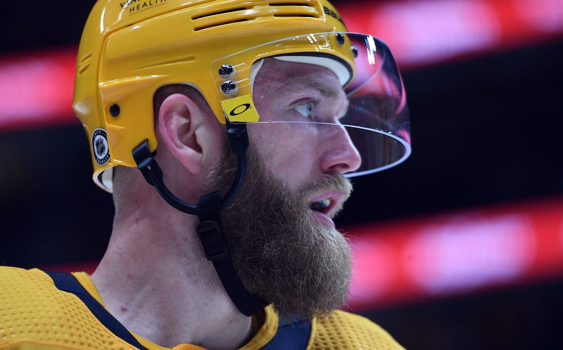 Apr 14, 2022; Nashville, Tennessee, USA; Nashville Predators defenseman Mattias Ekholm (14) waits for a face off during the third period against the Edmonton Oilers at Bridgestone Arena. Mandatory Credit: Christopher Hanewinckel-USA TODAY Sports