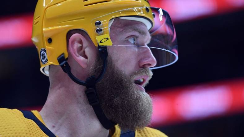 Apr 14, 2022; Nashville, Tennessee, USA; Nashville Predators defenseman Mattias Ekholm (14) waits for a face off during the third period against the Edmonton Oilers at Bridgestone Arena. Mandatory Credit: Christopher Hanewinckel-USA TODAY Sports