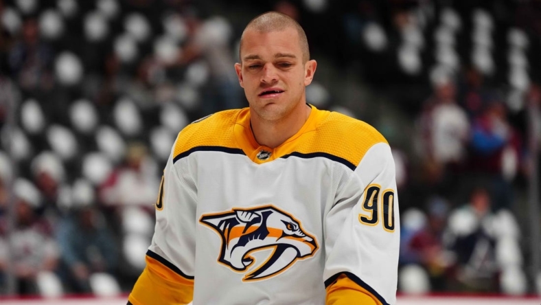 May 5, 2022; Denver, Colorado, USA; Nashville Predators defenseman Mark Borowiecki (90) warms up before game two of the first round of the 2022 Stanley Cup Playoffs against the Colorado Rockies at Ball Arena. Mandatory Credit: Ron Chenoy-USA TODAY Sports