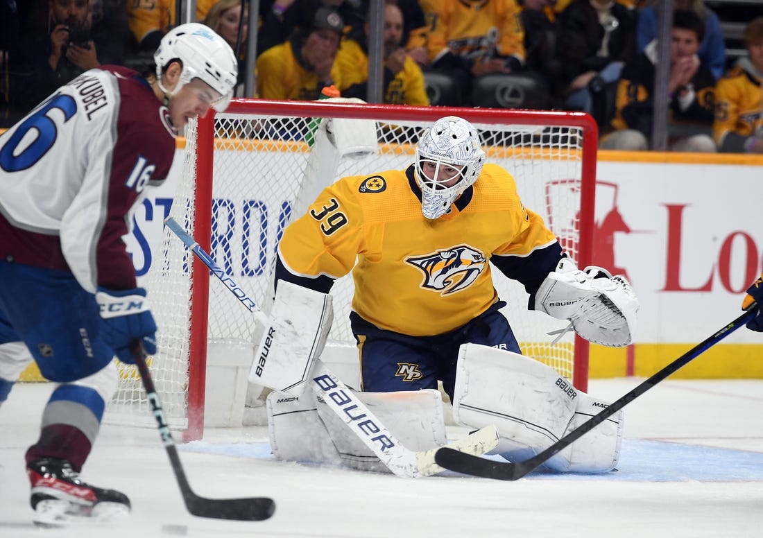 May 7, 2022; Nashville, Tennessee, USA; Nashville Predators goaltender Connor Ingram (39) makes a save on a shot by Colorado Avalanche right wing Nicolas Aube-Kubel (16) during the second period in game three of the first round of the 2022 Stanley Cup Playoffs at Bridgestone Arena. Mandatory Credit: Christopher Hanewinckel-USA TODAY Sports