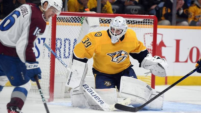 May 7, 2022; Nashville, Tennessee, USA; Nashville Predators goaltender Connor Ingram (39) makes a save on a shot by Colorado Avalanche right wing Nicolas Aube-Kubel (16) during the second period in game three of the first round of the 2022 Stanley Cup Playoffs at Bridgestone Arena. Mandatory Credit: Christopher Hanewinckel-USA TODAY Sports