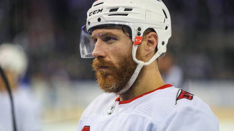 May 24, 2022; New York, New York, USA; Carolina Hurricanes defenseman Ian Cole (28) talks with coaches during the third period against the New York Rangers in game four of the second round of the 2022 Stanley Cup Playoffs at Madison Square Garden. Mandatory Credit: Danny Wild-USA TODAY Sports