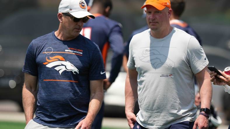 Jun 13, 2022; Englewood, CO, USA; Denver Broncos general manager George Paton and head coach Nathaniel Hackett during mini camp drills at the UCHealth Training Center. Mandatory Credit: Ron Chenoy-USA TODAY Sports