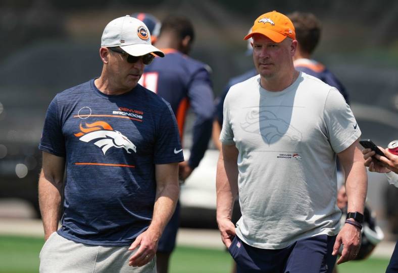 Jun 13, 2022; Englewood, CO, USA; Denver Broncos general manager George Paton and head coach Nathaniel Hackett during mini camp drills at the UCHealth Training Center. Mandatory Credit: Ron Chenoy-USA TODAY Sports