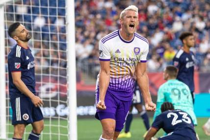 Jun 15, 2022; Foxborough, Massachusetts, USA; Orlando City SC defender Robin Jansson (6) celebrates after scoring a goal during the first half against the New England Revolution at Gillette Stadium. Mandatory Credit: Paul Rutherford-USA TODAY Sports