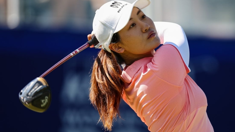 Jun 25, 2022; Bethesda, Maryland, USA; Xiyu Lin plays her shot from the first tee during the third round of the KPMG Women's PGA Championship golf tournament at Congressional Country Club. Mandatory Credit: Scott Taetsch-USA TODAY Sports