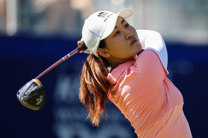 Jun 25, 2022; Bethesda, Maryland, USA; Xiyu Lin plays her shot from the first tee during the third round of the KPMG Women's PGA Championship golf tournament at Congressional Country Club. Mandatory Credit: Scott Taetsch-USA TODAY Sports