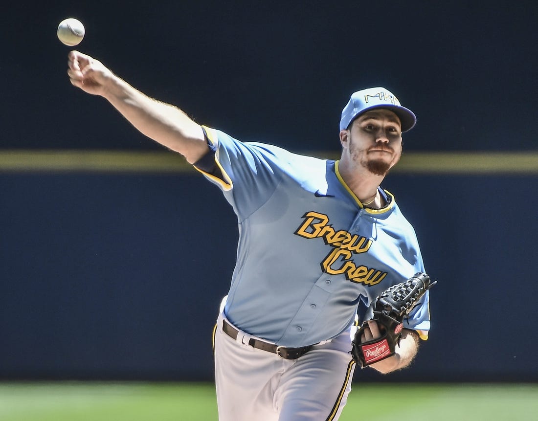 Jun 26, 2022; Milwaukee, Wisconsin, USA; Milwaukee Brewers pitcher Chi Chi Gonzalez (21) throws a pitch in the first inning against the Toronto Blue Jays at American Family Field. Mandatory Credit: Benny Sieu-USA TODAY Sports