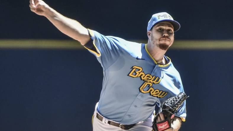 Jun 26, 2022; Milwaukee, Wisconsin, USA; Milwaukee Brewers pitcher Chi Chi Gonzalez (21) throws a pitch in the first inning against the Toronto Blue Jays at American Family Field. Mandatory Credit: Benny Sieu-USA TODAY Sports