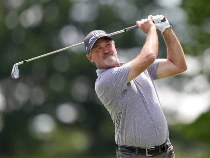 Jerry Kelly watches his shot down the fairway on the 15th hole during third round of the Bridgestone Senior Players Championship at Firestone Country Club, Saturday, July 9, 2022, in Akron, Ohio. [Jeff Lange/Beacon Journal]

Bridgestone 3