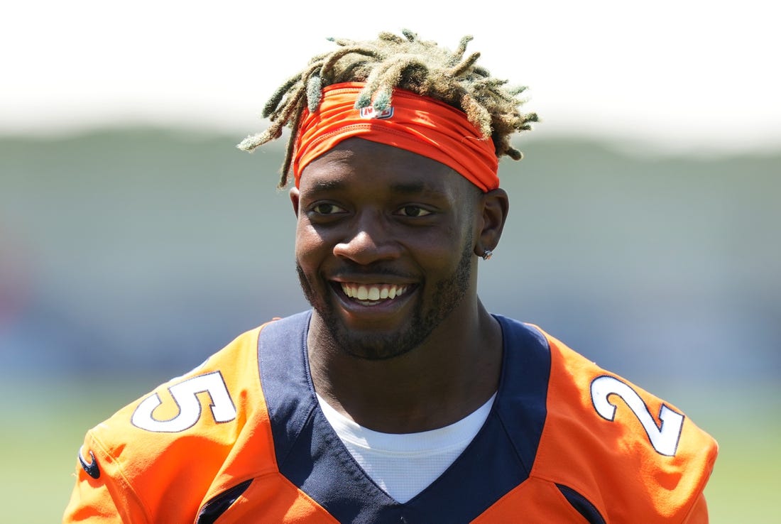 Jul 27, 2022; Englewood, CO, USA; Denver Broncos running back Melvin Gordon (25) following training camp at the UCHealth Training Center. Mandatory Credit: Ron Chenoy-USA TODAY Sports