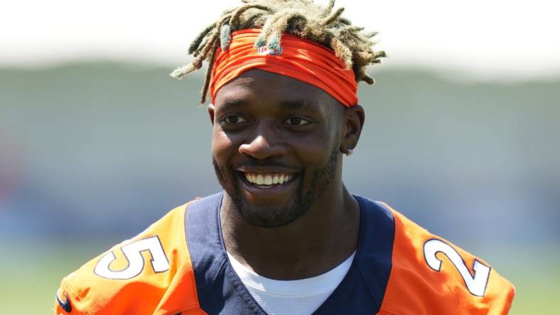 Jul 27, 2022; Englewood, CO, USA; Denver Broncos running back Melvin Gordon (25) following training camp at the UCHealth Training Center. Mandatory Credit: Ron Chenoy-USA TODAY Sports