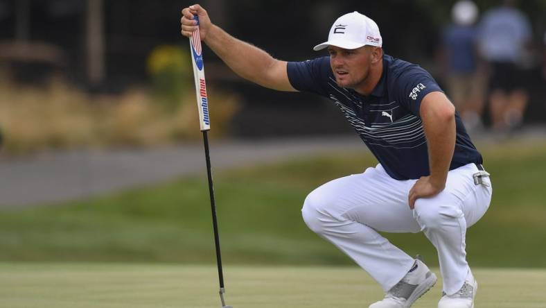 Jul 29, 2022; Bedminster, New Jersey, USA;  Bryson DeChambeau lines up a putt on the 9th green during the first round of a LIV Golf tournament at Trump National Golf Club Bedminster. Mandatory Credit: John Jones-USA TODAY Sports