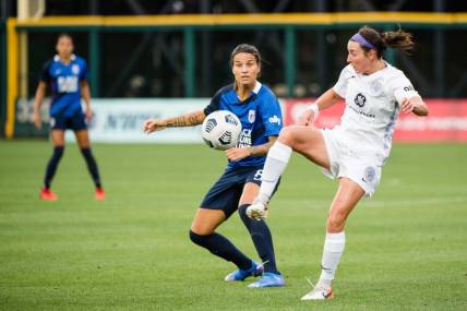 TACOMA, WA - JULY 31: Erin Simon #3 of Racing Louisville FC clears the ball during a game between Racing Louisville FC and OL Reign at Cheney Stadium on July 31, 2021 in Tacoma, Washington. Mandatory credit: Jane Gershovich/ISI Photos via Imagn