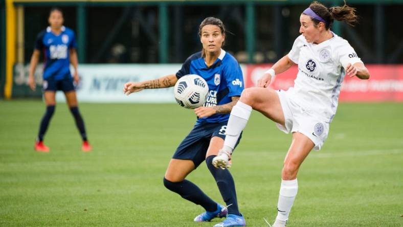 TACOMA, WA - JULY 31: Erin Simon #3 of Racing Louisville FC clears the ball during a game between Racing Louisville FC and OL Reign at Cheney Stadium on July 31, 2021 in Tacoma, Washington. Mandatory credit: Jane Gershovich/ISI Photos via Imagn