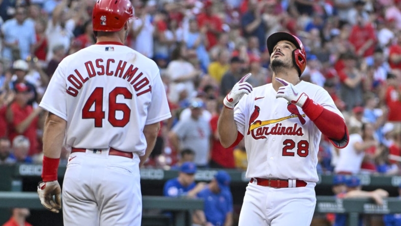 Aug 4, 2022; St. Louis, Missouri, USA;  St. Louis Cardinals third baseman Nolan Arenado (28) celebrates with designated hitter Paul Goldschmidt (46) after hitting a two run home run against the Chicago Cubs during the first inning at Busch Stadium. Mandatory Credit: Jeff Curry-USA TODAY Sports