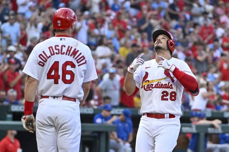 Aug 4, 2022; St. Louis, Missouri, USA;  St. Louis Cardinals third baseman Nolan Arenado (28) celebrates with designated hitter Paul Goldschmidt (46) after hitting a two run home run against the Chicago Cubs during the first inning at Busch Stadium. Mandatory Credit: Jeff Curry-USA TODAY Sports