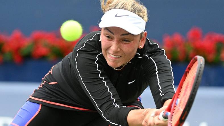 Aug 8, 2022; Toronto, ON, Canada;   Donna Vekic (CRO) plays a shot against Simona Halep (ROU) in first round play in the National Bank Open at Sobeys Stadium. Mandatory Credit: Dan Hamilton-USA TODAY Sports