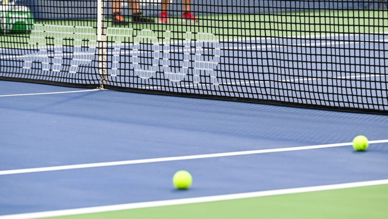 Aug 8, 2022; Montreal, Quebec, Canada; View of an ATP Tour logo on a net on central court before first round play at IGA Stadium. Mandatory Credit: David Kirouac-USA TODAY Sports