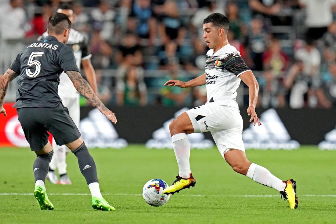 Aug 10, 2022; Saint Paul, MN, USA; Liga MX midfielder Erik Lira (6) of Cruz Azul moves the ball against MLS forward Taxiarchis Fountas (5) of DC United during the MLS All-Star Game at Allianz Field. Mandatory Credit: John David Mercer-USA TODAY Sports