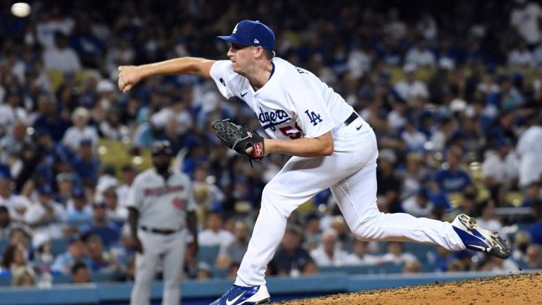 Aug 10, 2022; Los Angeles, California, USA; Los Angeles Dodgers relief pitcher Evan Phillips (59) pitches against the Minnesota Twins in the seventh inning at Dodger Stadium. Mandatory Credit: Richard Mackson-USA TODAY Sports