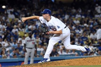 Aug 10, 2022; Los Angeles, California, USA; Los Angeles Dodgers relief pitcher Evan Phillips (59) pitches against the Minnesota Twins in the seventh inning at Dodger Stadium. Mandatory Credit: Richard Mackson-USA TODAY Sports