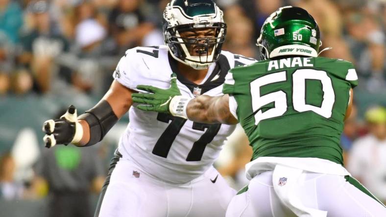 Aug 12, 2022; Philadelphia, Pennsylvania, USA; Philadelphia Eagles offensive tackle Andre Dillard (77) blocks New York Jets defensive end Bradlee Anae (50) at Lincoln Financial Field. Mandatory Credit: Eric Hartline-USA TODAY Sports